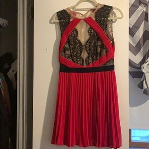 BCBG red pleated dress with black lace
